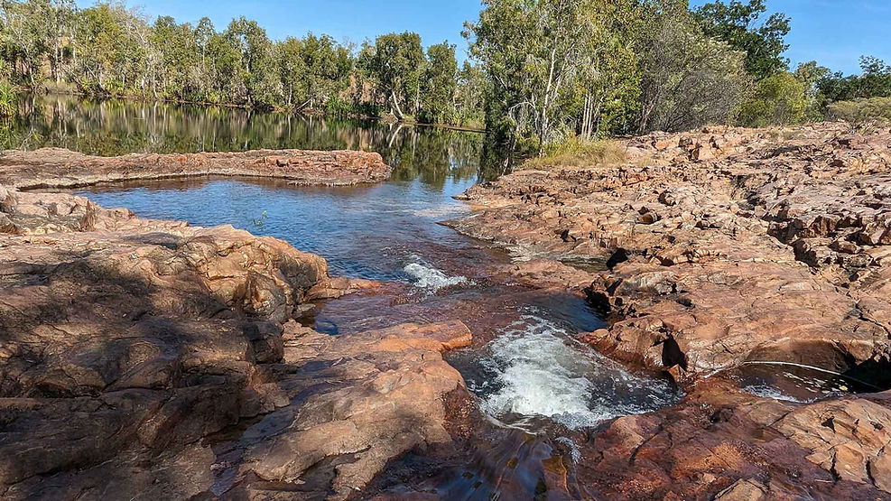 river rapids into calm lake